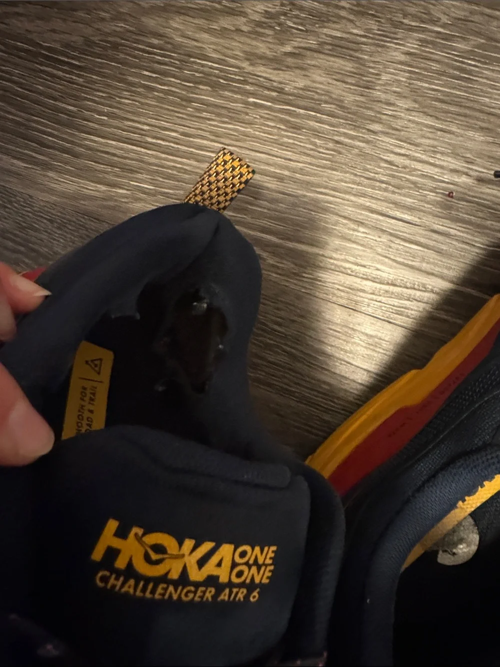Hoka Men's Navy Athletic Shoes with Red and Yellow Accents